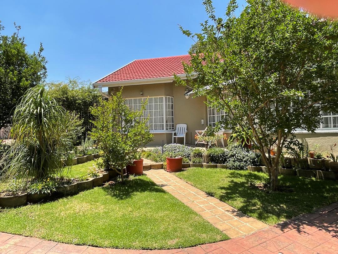 Luxury backyard pool and garden with family